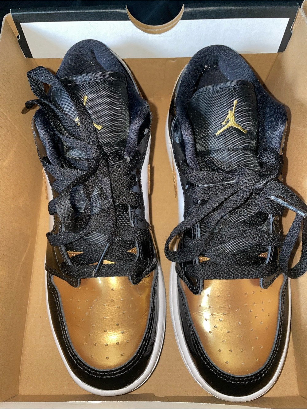Jordan Black & Metallic Gold Low-Top Sneakers
